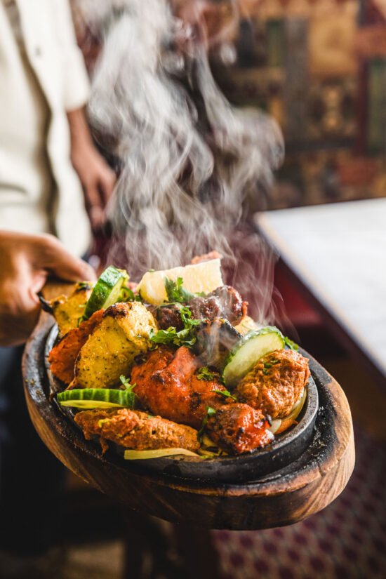 Delicious Fish Tikka Kebab, grilled and served with mint chutney and lemon wedges